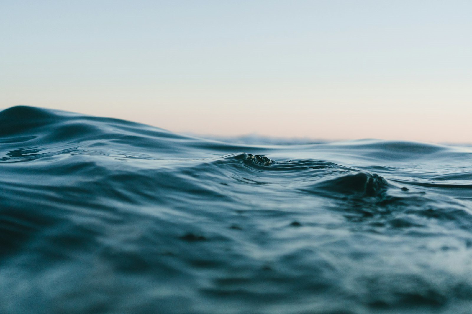 Calm open water at dusk